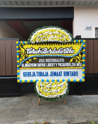 Papan Bunga Duka di Sota
